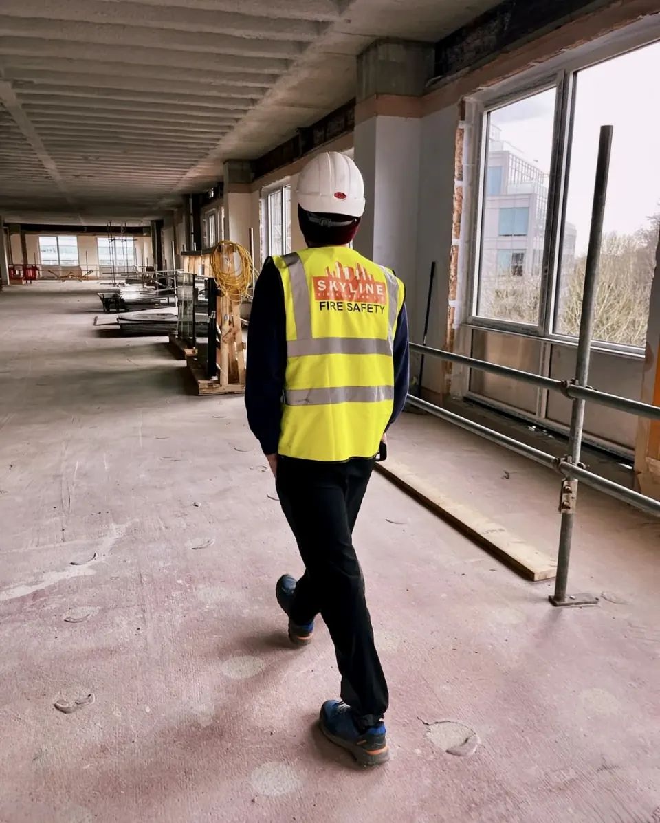 Skyline surveyor inspecting firestopping on site