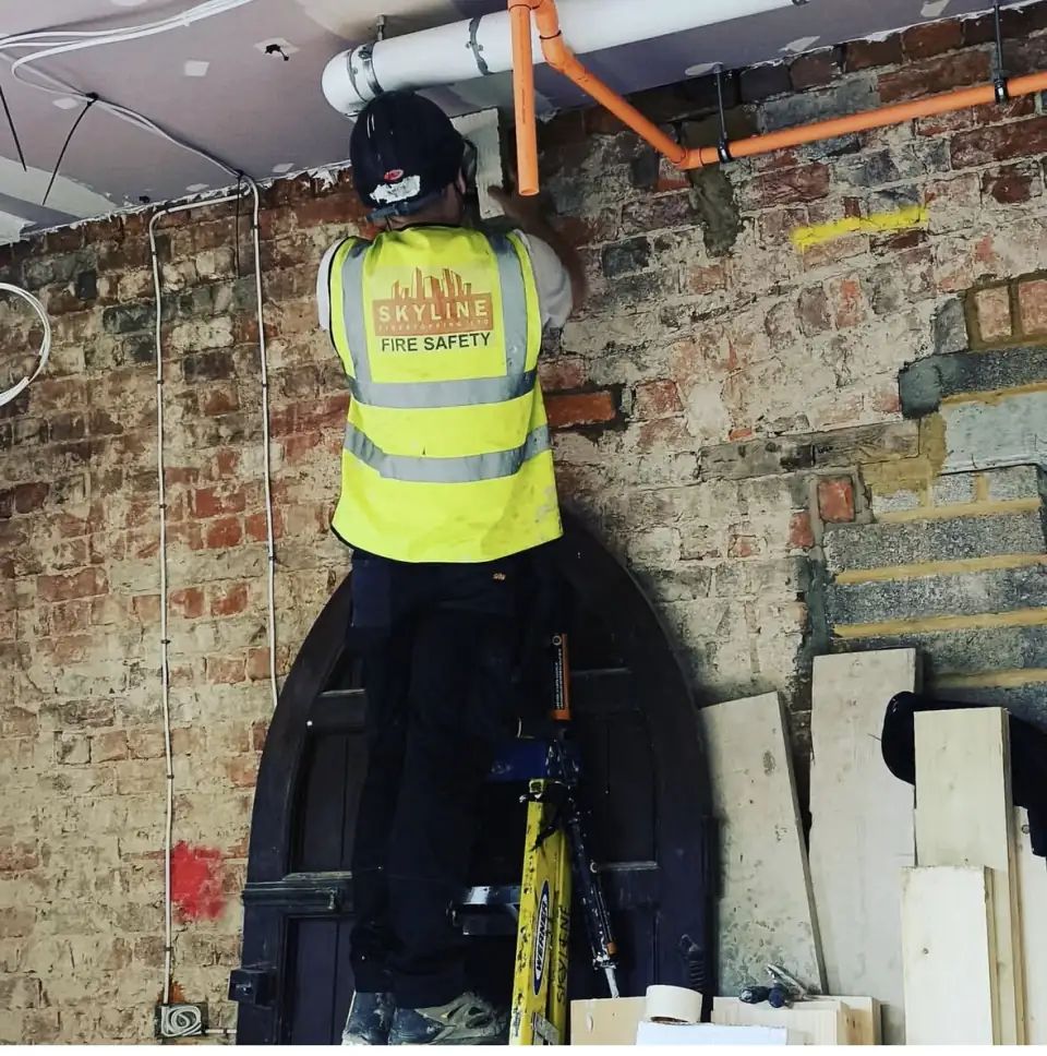 Skyline operative fitting a firestopping system